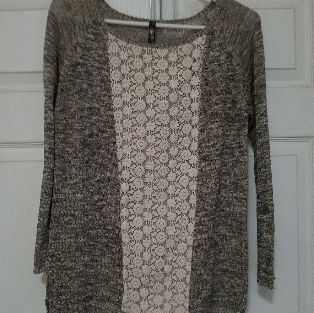 Size large gray and cream light sweater.